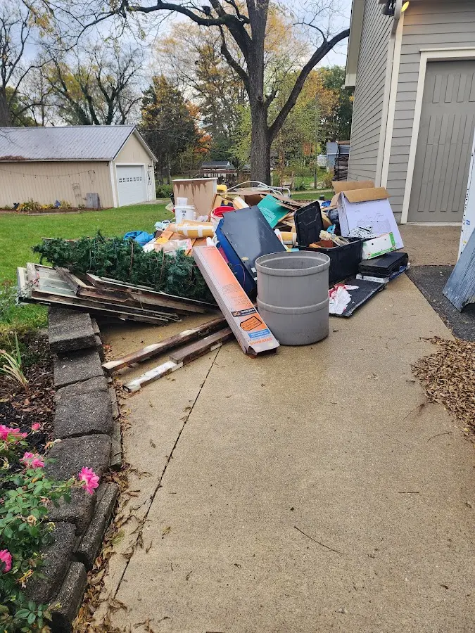 Dumpster being loaded with debris for 3 Yard Dumpster Rental in Allamuchy